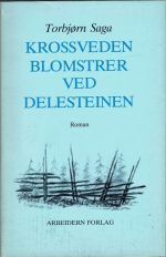 Krossveden blomstrer ved delesteinen